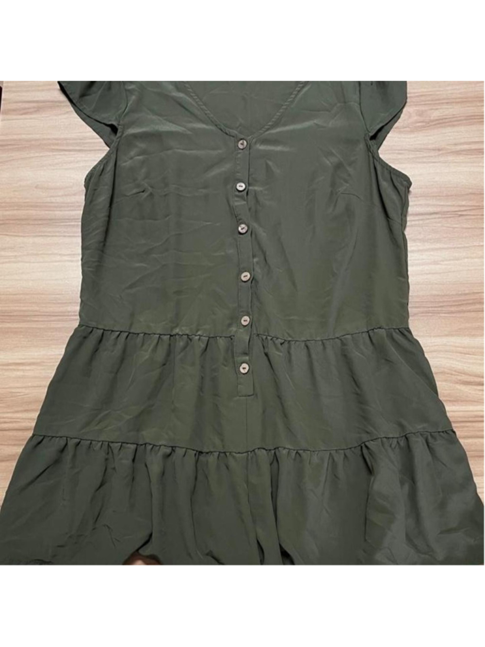 Lily Rose olive green romper with a button front, flutter sleeves, V-neckline, a